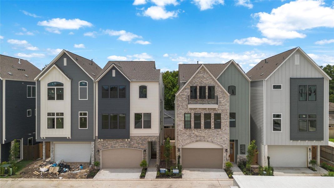 Front exterior of a new home in Spring Valley Creek, Houston, TX, highlighting curb appeal (Image 1). Front exterior of a new home in Spring Valley Creek, Houston, TX, highlighting curb appeal (Image 1).