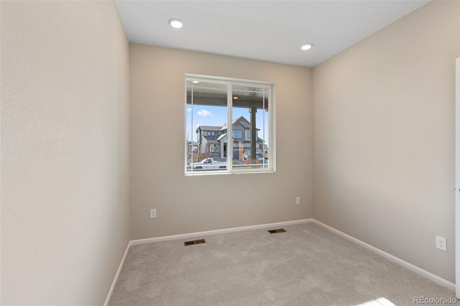 Spacious, unfurnished interior of a new home in The Cottages Collection at Ridgeline Vista, Brighton (Image 13).