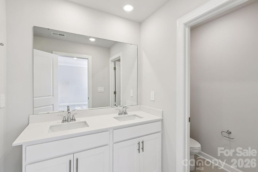 Photo is not of the actual home, but is an inspirational photo of builder’s model home and may depict options, furnishings, and/or decorator features that are not included