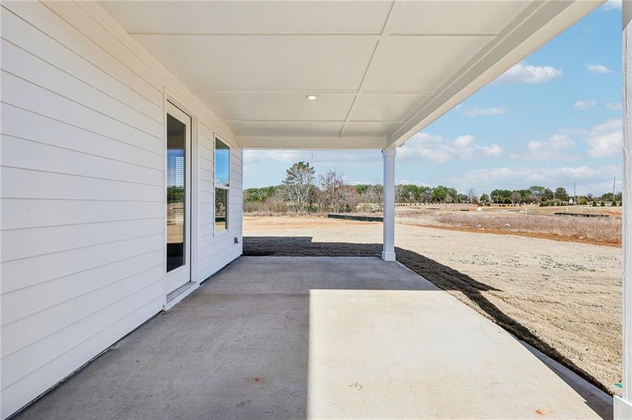 Exterior details and patio area of a home in River Pointe, Monroe (Image 3).