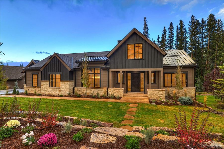 Front exterior of a new home in , Keystone, CO, highlighting curb appeal (Image 27).