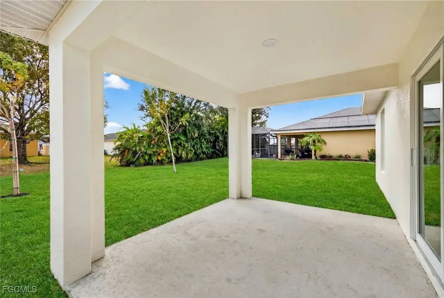 Exterior details and patio area of a home in Cape Coral, Cape Coral (Image 4). Exterior details and patio area of a home in Cape Coral, Cape Coral (Image 4).