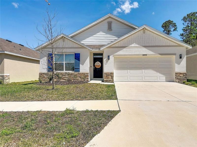 Front exterior of a new home in , San Antonio, FL, highlighting curb appeal (Image 27).