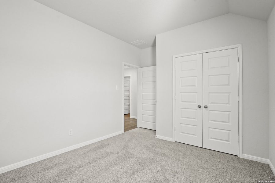 Spacious, unfurnished interior of a new home in Hunters Ranch, San Antonio (Image 28).