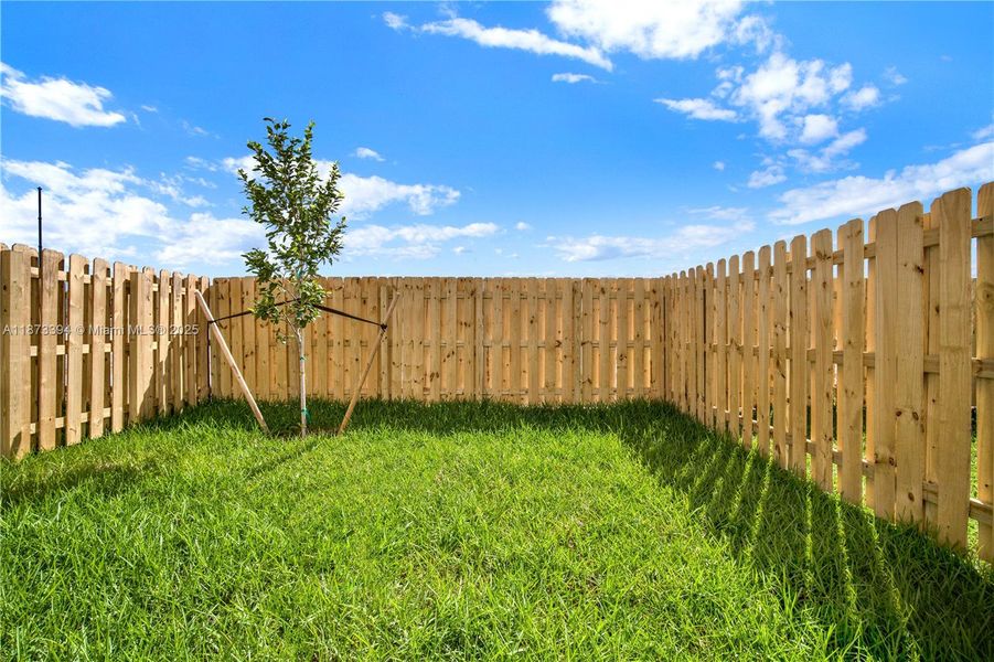Front exterior of a new home in Cedar Pointe: Cypress Collection, Homestead, FL, highlighting curb appeal (Image 17).