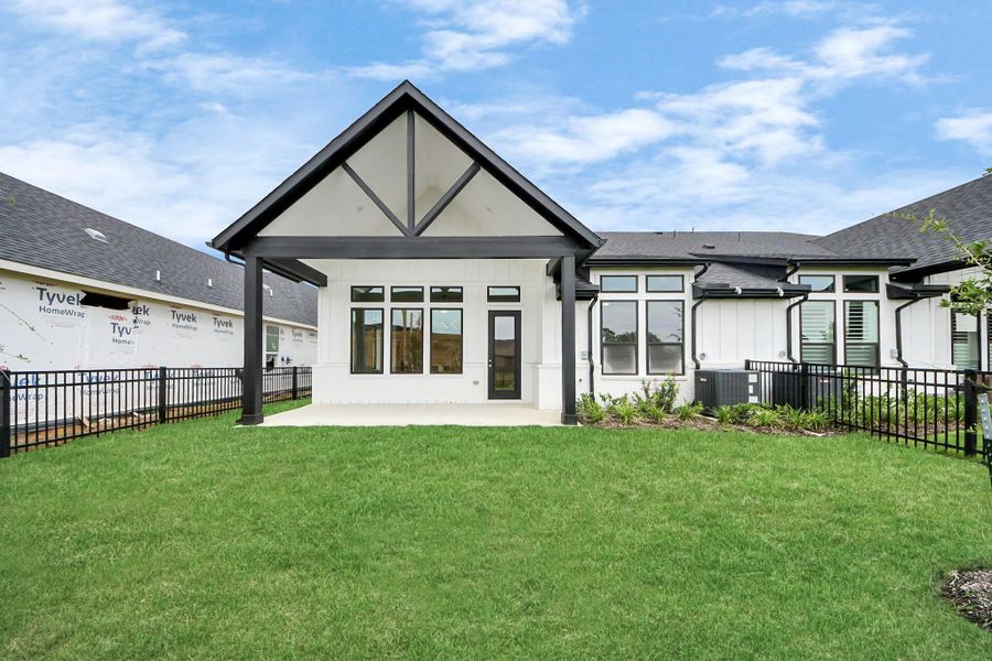 Front exterior of a new home in Gatherings® at Chambers Creek: Duets Collection, Willis, TX, highlighting curb appeal (Image 22). Front exterior of a new home in Gatherings® at Chambers Creek: Duets Collection, Willis, TX, highlighting curb appeal (Image 22).