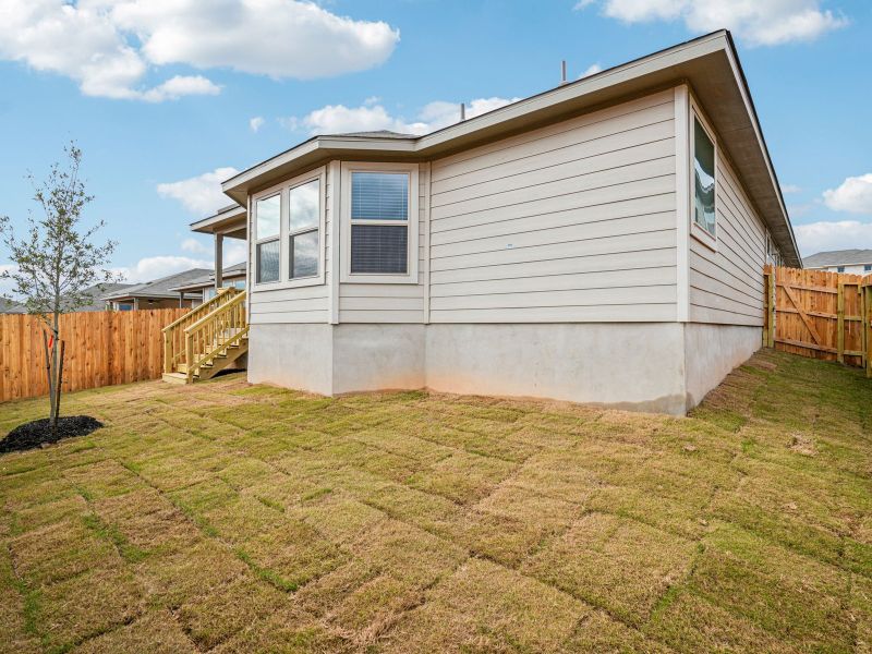 Exterior details and patio area of a home in Lark Canyon, New Braunfels (Image 20).