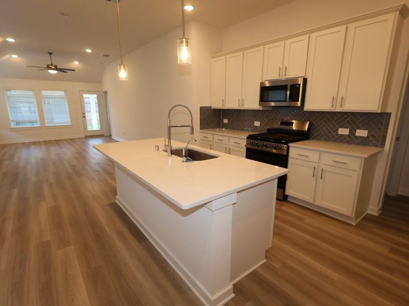 Furnished interior view inside a new home in Pinewood at Grand Texas, New Caney (Image 7).
