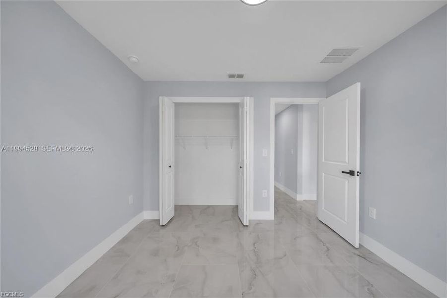 Spacious, unfurnished interior of a new home in , Lehigh Acres (Image 28). Spacious, unfurnished interior of a new home in , Lehigh Acres (Image 28).