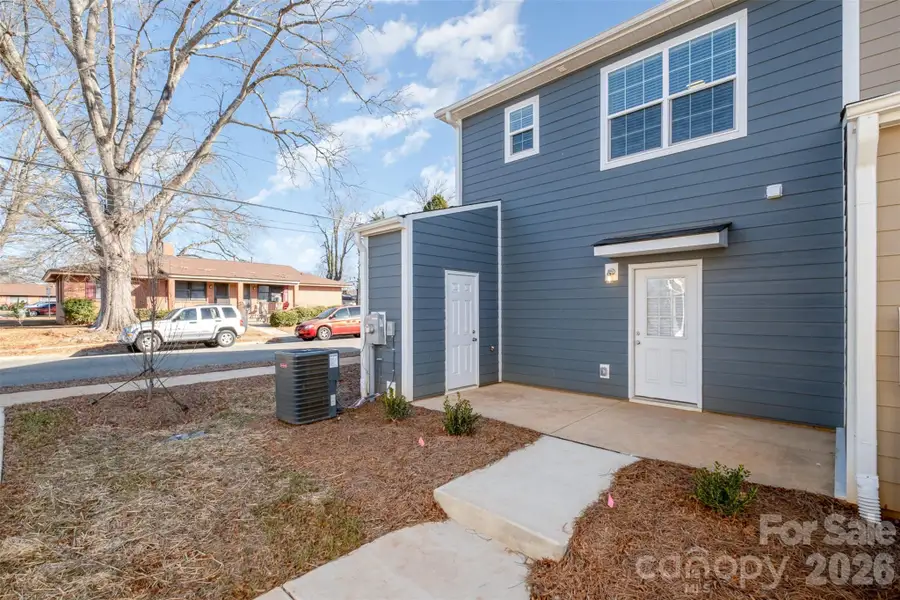Exterior details and patio area of a home in , Concord (Image 3).