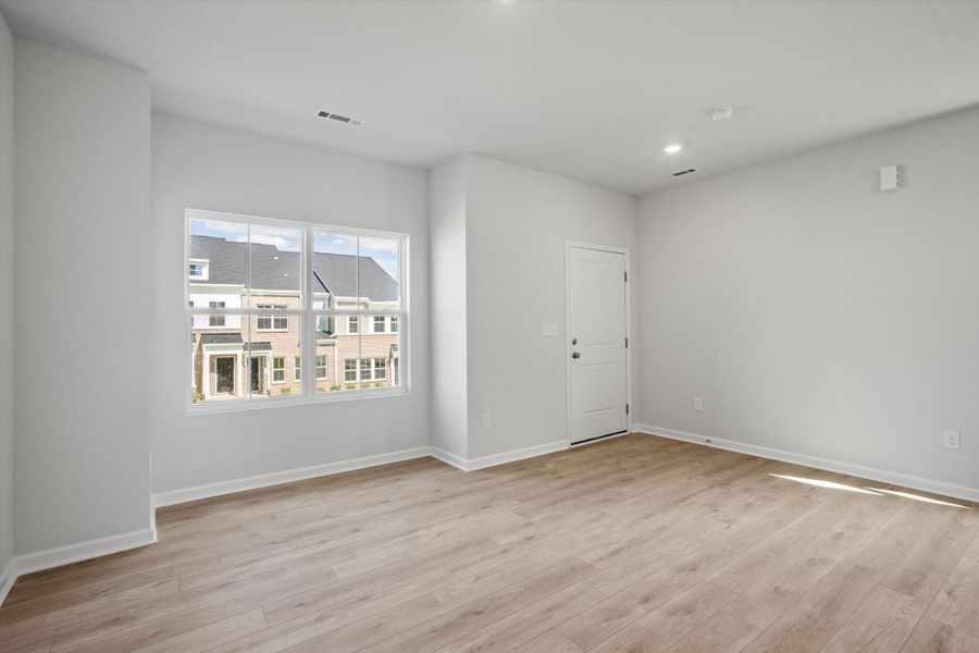 Spacious, unfurnished interior of a new home in Renaissance at White Oak, Garner (Image 12).