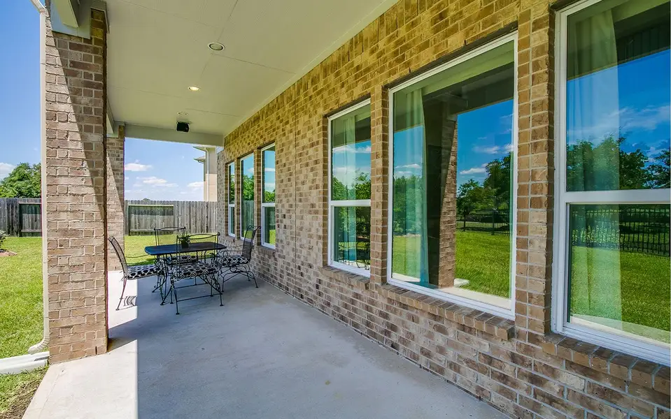 Exterior details and patio area of a home in Marvida, Cypress (Image 2).