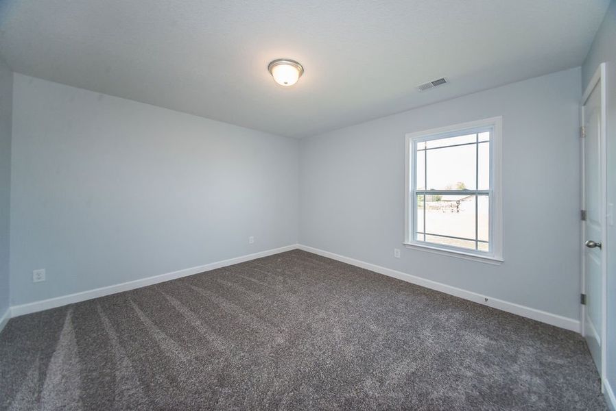 Representative unfurnished interior of a home built from the Franklin by Enchanted Homes in Guadalupe Heights, Seguin (Image 44).