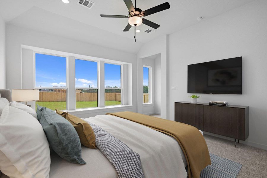 Primary Bedroom with elevated ceiling Primary Bedroom with elevated ceiling