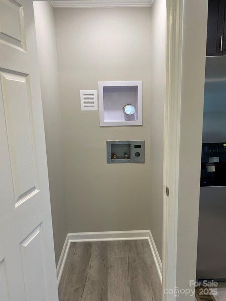 LAUNDRY CLOSET OFF OF KITCHEN