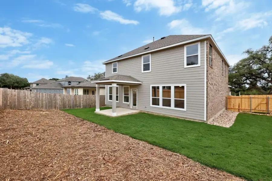 Exterior details and patio area of a home in River Bluff, Leander (Image 20).