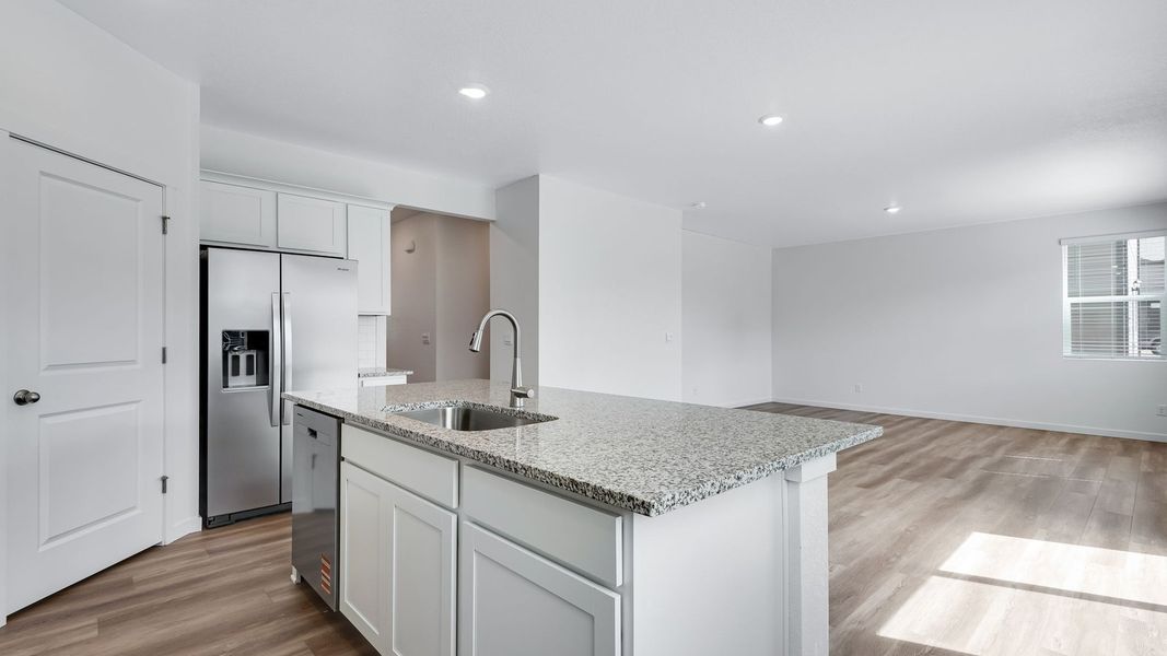 Furnished interior view inside a new home in Trails at Crowfoot, Parker (Image 7).