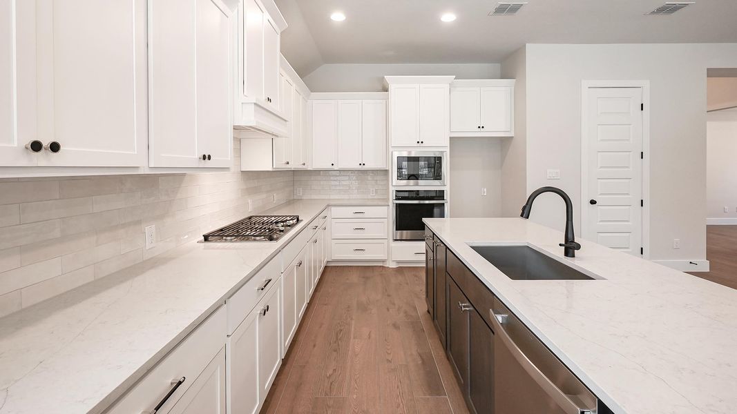 Furnished interior view inside a new home in Crosswinds, Kyle (Image 11).