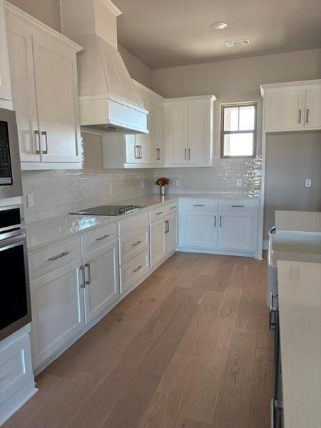 Furnished interior view inside a new home in , Van Alstyne (Image 13).