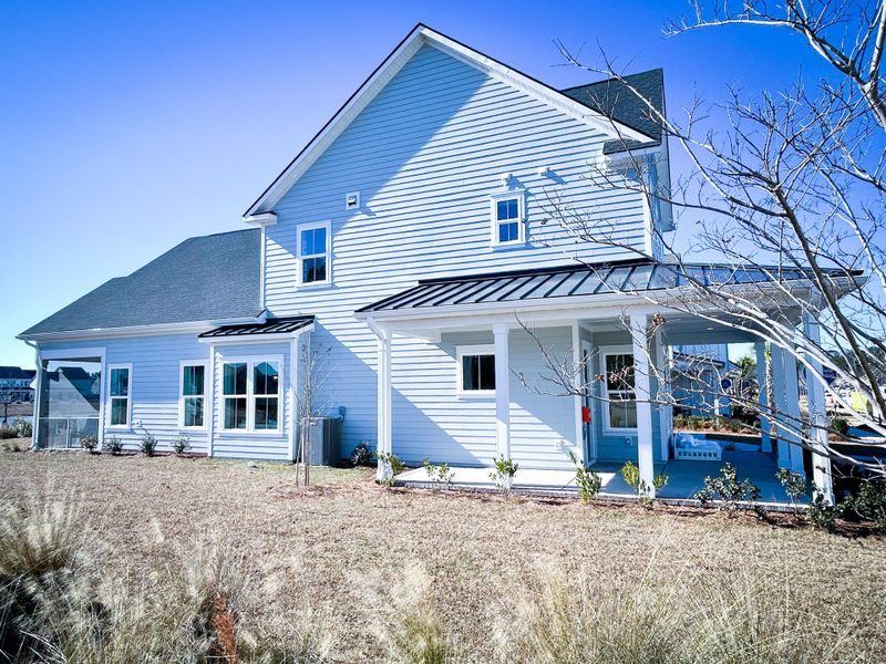 Front exterior of a new home in , Summerville, SC, highlighting curb appeal (Image 27).