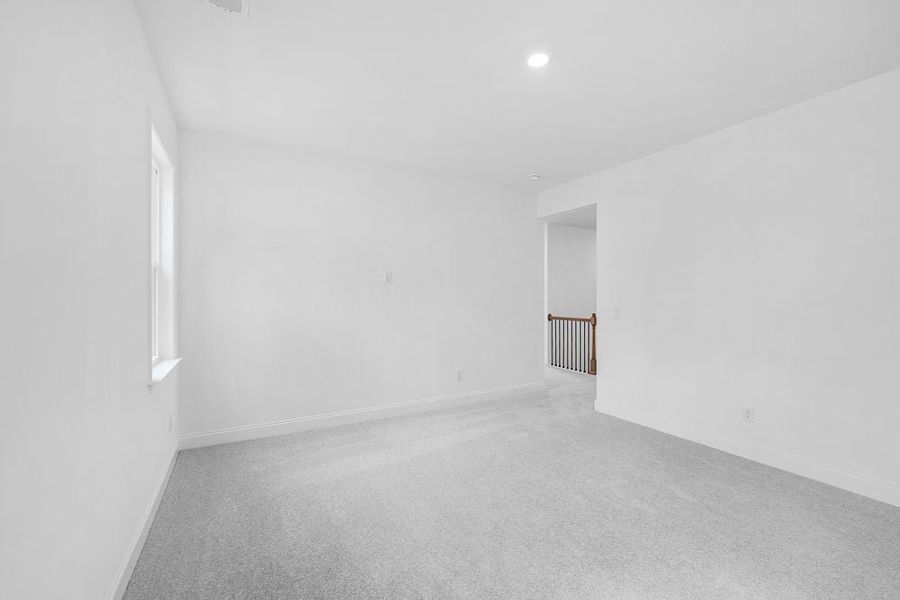 Representative unfurnished interior of a home built from the Lawrence by Taylor Morrison in Watson Park, Snellville (Image 20).
