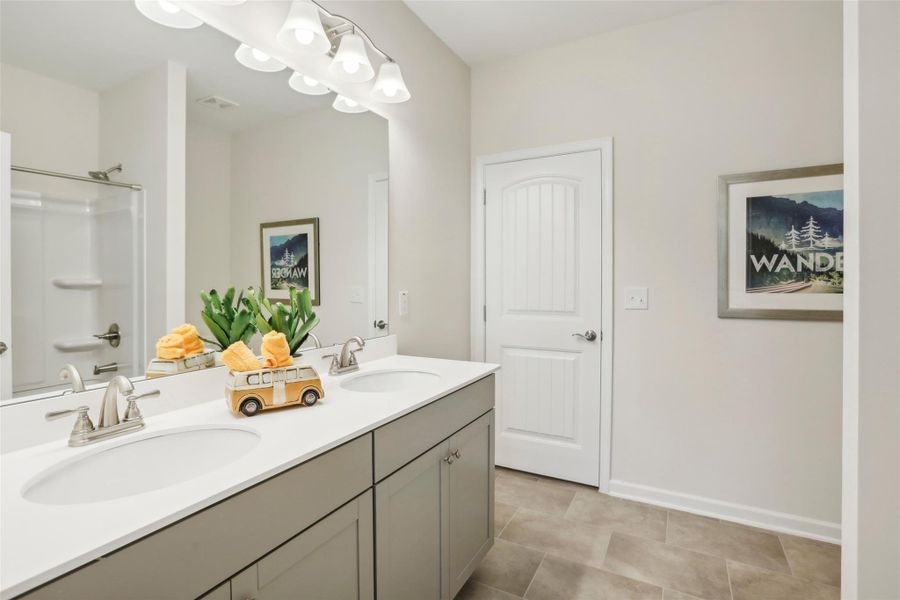 The Avondale- Hall Bath. Sample image for illustration; upgrades, options, and colors may vary.