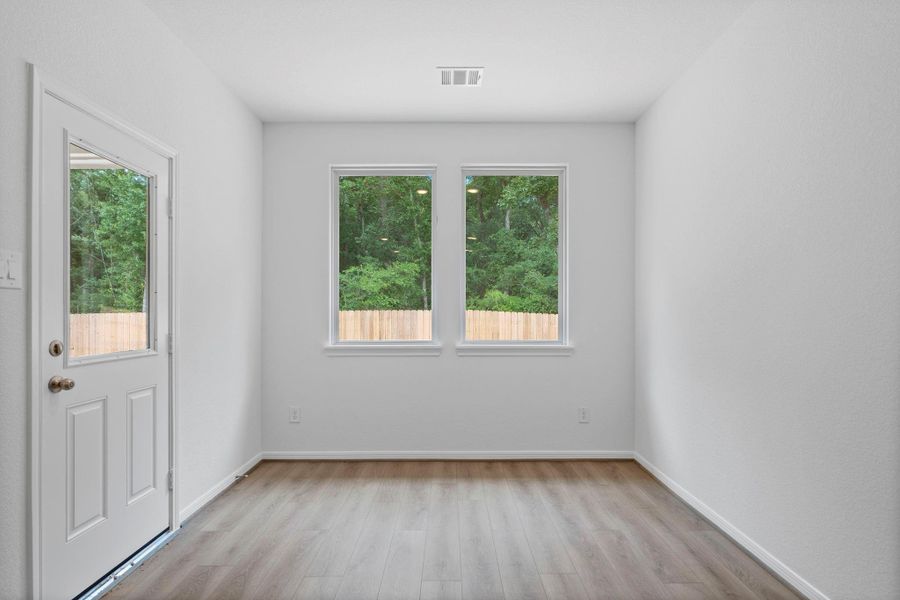 With an abundance of natural light streaming through the windows, the breakfast nook is bathed in a sunny glow, creating the perfect atmosphere to enjoy your morning coffee or a family breakfast. With an abundance of natural light streaming through the windows, the breakfast nook is bathed in a sunny glow, creating the perfect atmosphere to enjoy your morning coffee or a family breakfast.