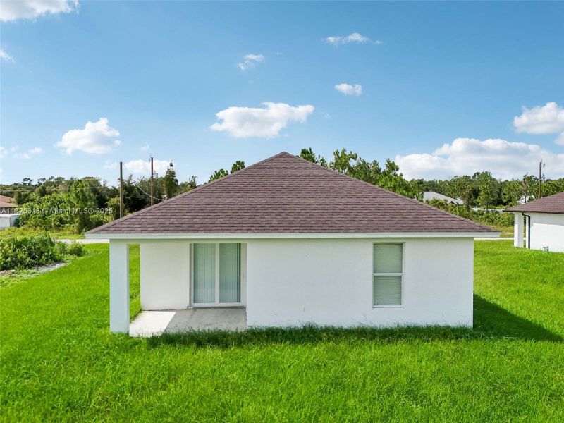 Exterior details and patio area of a home in , Lehigh Acres (Image 27). Exterior details and patio area of a home in , Lehigh Acres (Image 27).