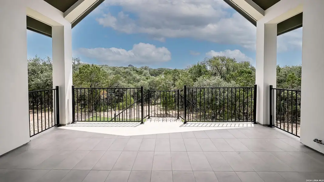 Exterior details and patio area of a home in The Preserve at Elm Creek, New Braunfels (Image 4).