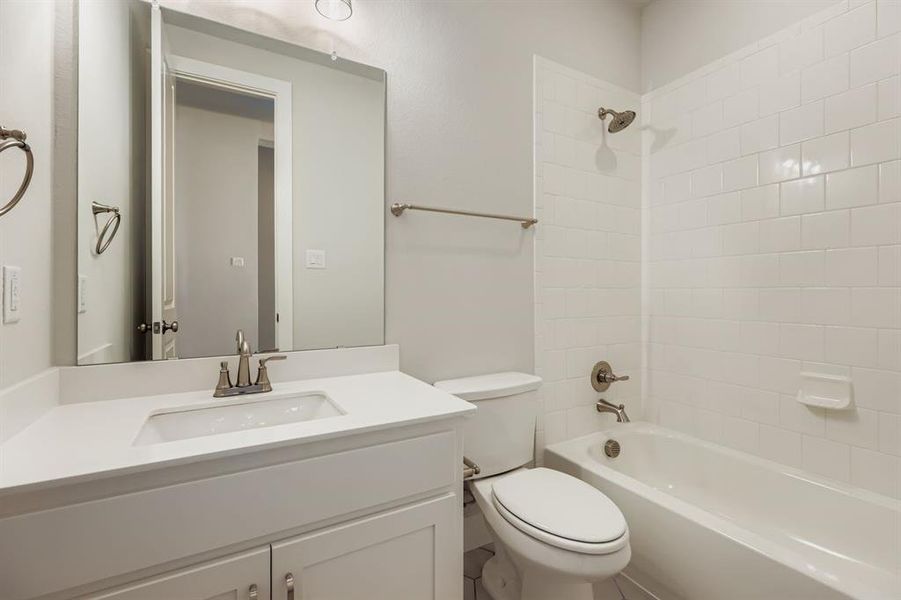 Full bath with shower / bathtub combination and vanity