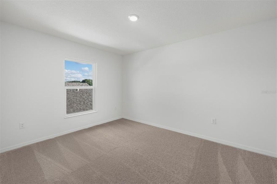 Spacious, unfurnished interior of a new home in Peach Crossings, Winter Haven (Image 23).