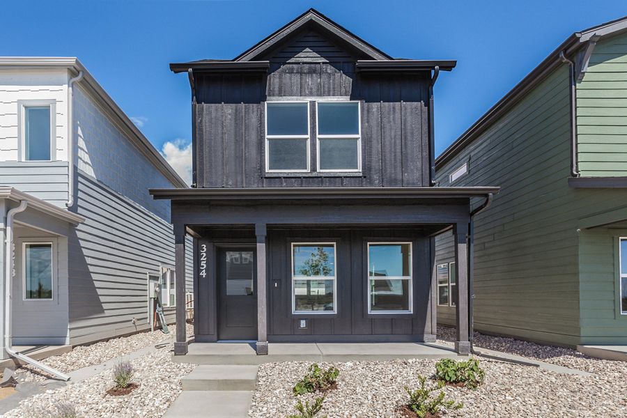 Front exterior of a new home in Bloom, Fort Collins, CO, highlighting curb appeal (Image 29).