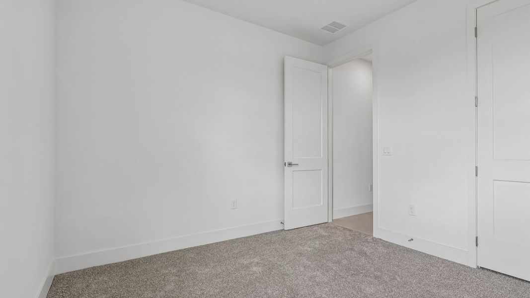 Furnished interior view inside a new home in Ardisia Park, New Smyrna Beach (Image 18).