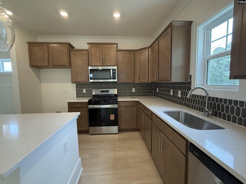 Furnished interior view inside a new home in Cottages at Roofs Pond, West Columbia (Image 7).