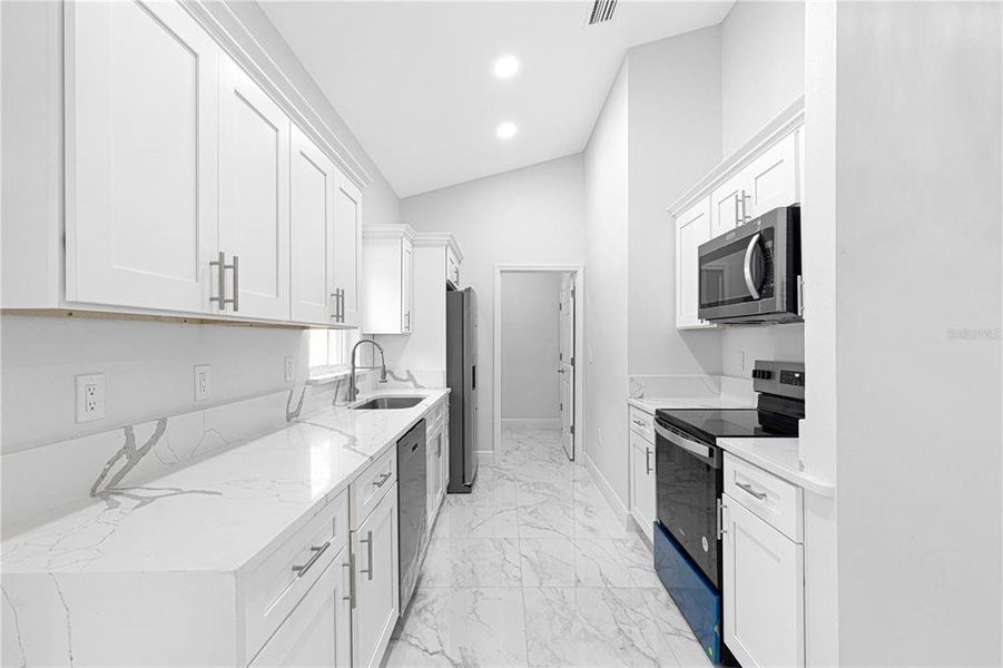Furnished interior view inside a new home in , Summerfield (Image 3).