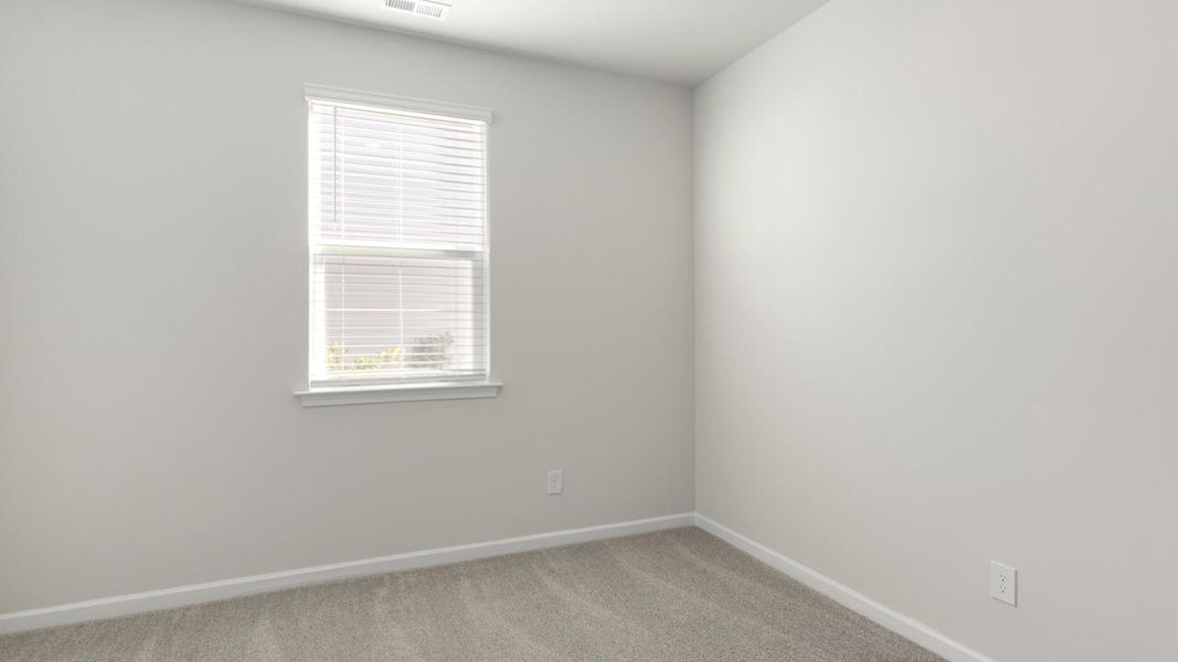 Spacious, unfurnished interior of a new home in The Grove at Blake Farm, Wilmington (Image 14).