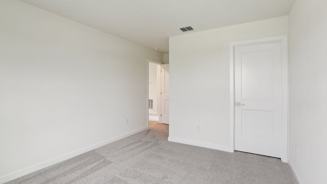 Naples Guest Bed with large closet at Grasslands West in Lakeland FL