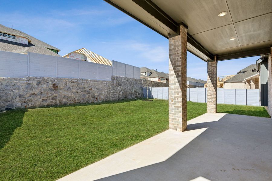 Exterior details and patio area of a home in Painted Tree Lakeside, McKinney (Image 3).