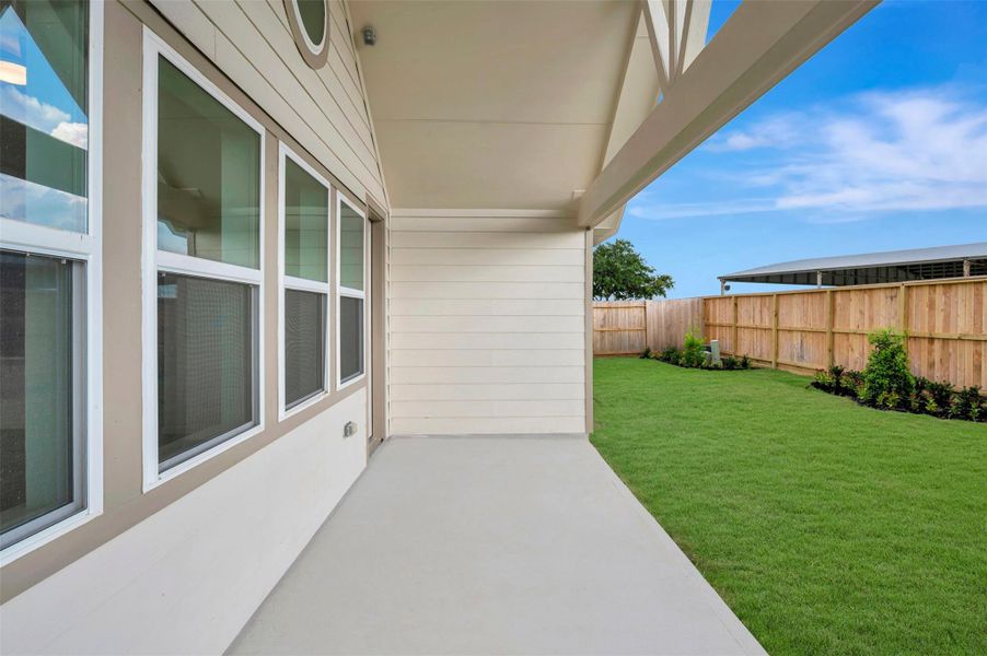 Relax outdoors on the covered patio