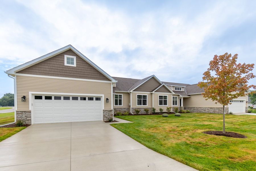 Representative exterior photo of a completed home built from the The Esher Paired Ranch Condominium by Norfolk Homes in Mystic Ridge, Whitmore Lake, MI (Image 31).