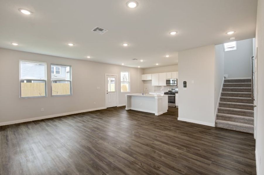 A large empty kitchen. A large empty kitchen.