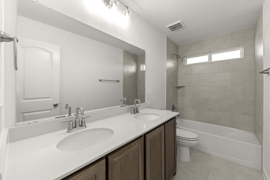 Furnished interior view inside a new home in The Reserve at Spiritas Ranch, Little Elm (Image 12).