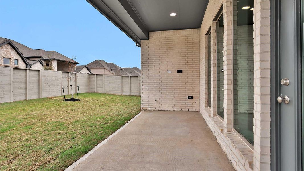 Exterior details and patio area of a home in Legacy, League City (Image 3).