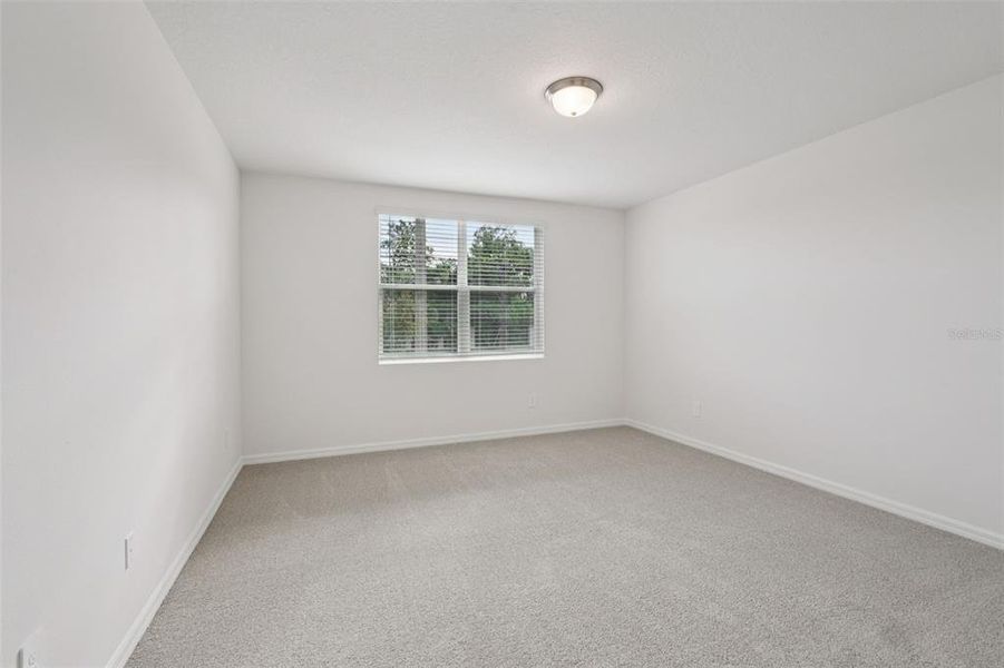 Spacious, unfurnished interior of a new home in The Meadow at Crossprairie, St. Cloud (Image 24).