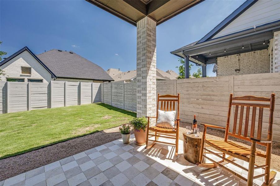 Covered patio and nice fence