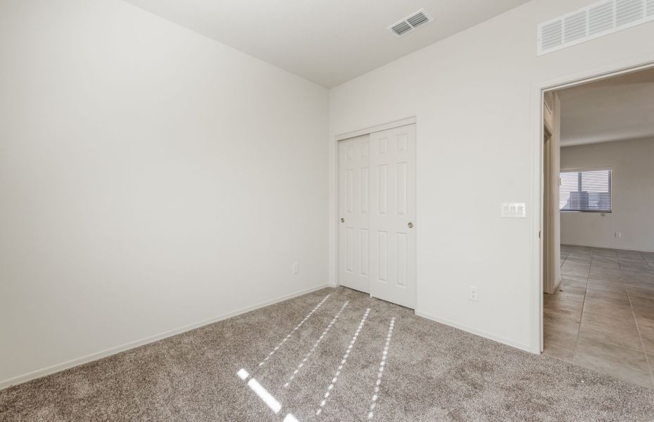 Spacious, unfurnished interior of a new home in Copper Falls, Buckeye (Image 18). Spacious, unfurnished interior of a new home in Copper Falls, Buckeye (Image 18).