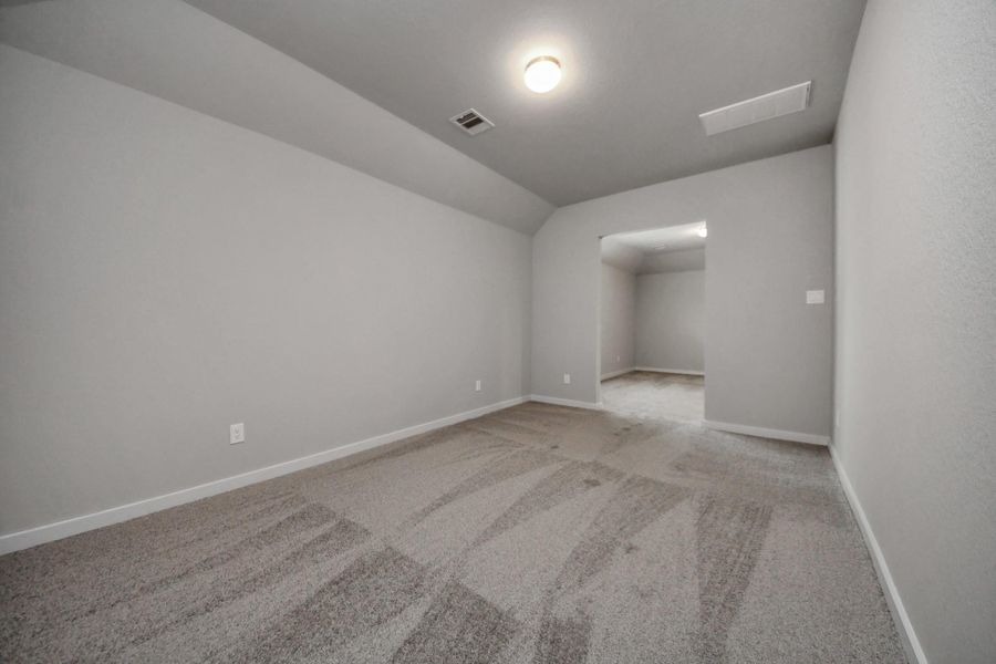 Come upstairs and enjoy a movie night with your friends and family in this spacious media room! Sample photo of completed home with similar floor plan. Actual colors and selections may vary. Come upstairs and enjoy a movie night with your friends and family in this spacious media room! Sample photo of completed home with similar floor plan. Actual colors and selections may vary.