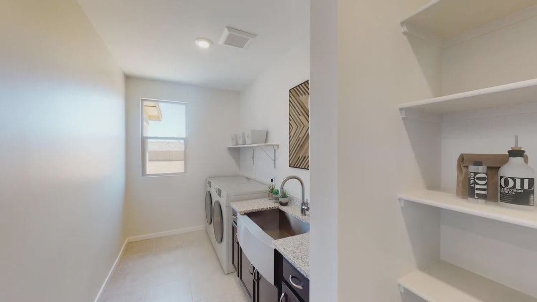 Representative furnished interior of a home built from the 201 by Elliott Homes in Las Barrancas, Yuma (Image 13).