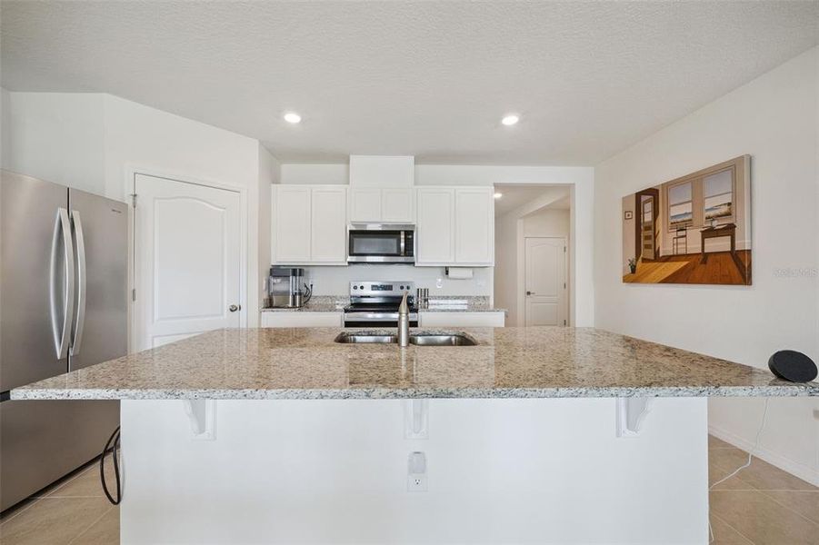 Furnished interior view inside a new home in Buena Lago, St. Cloud (Image 6).