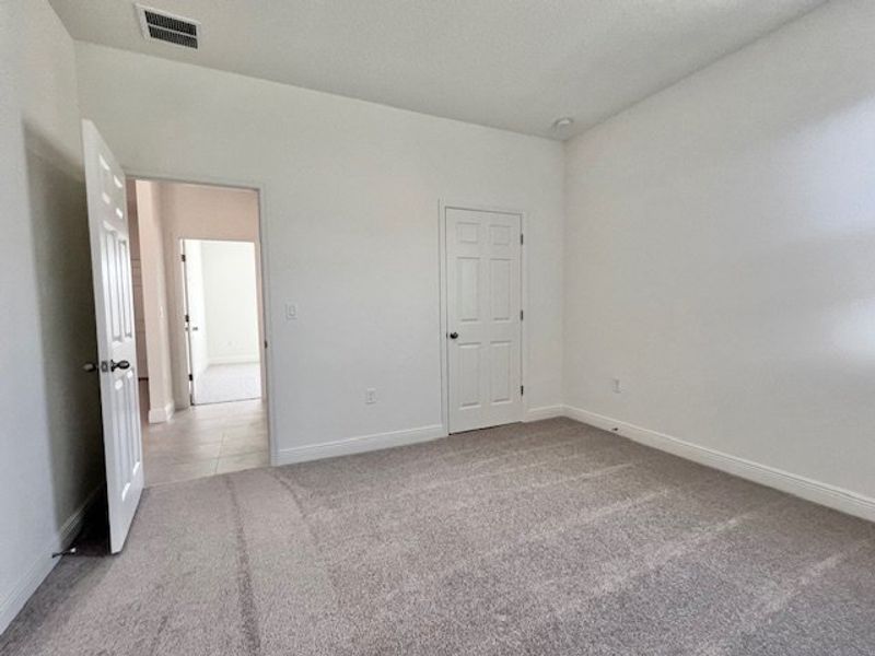 Spacious, unfurnished interior of a new home in Lakes At St Sebastian, Micco (Image 18).